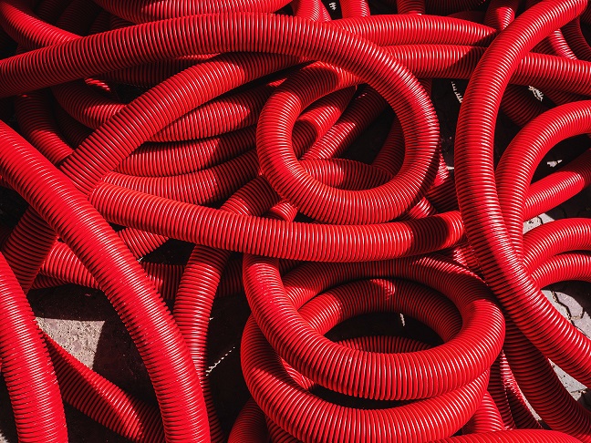 red platics pipes- Flexible plastic tubing